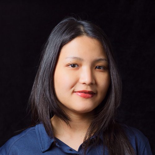 Corporate headshot of a young woman