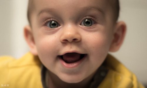 Up close portrait of a smiling baby